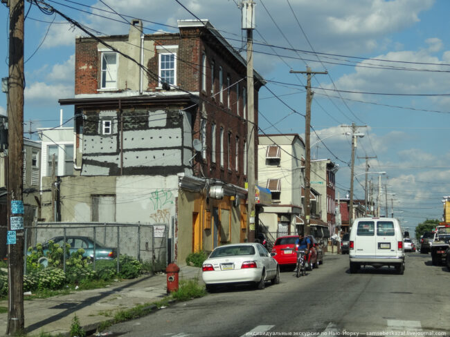 city street with dilapidated housing