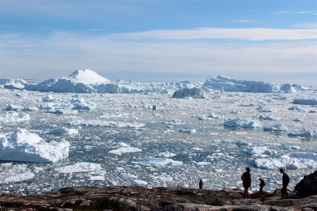 Glaciers with people in foreground