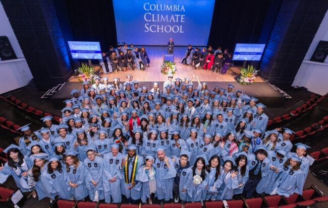 Group of graduates in an auditorium