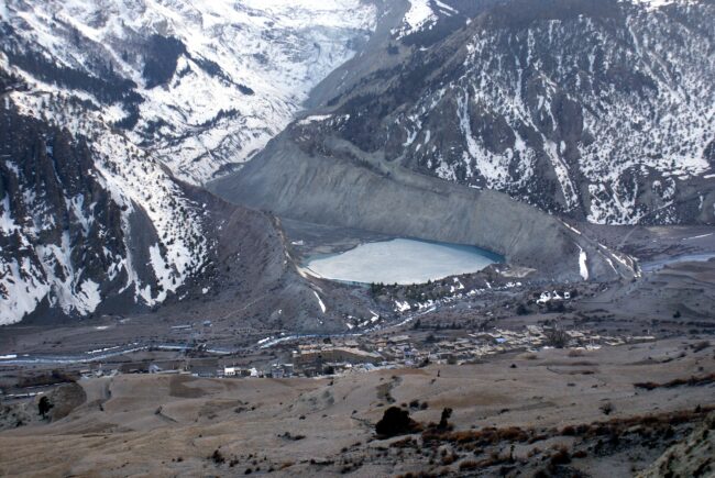 Glacier above village