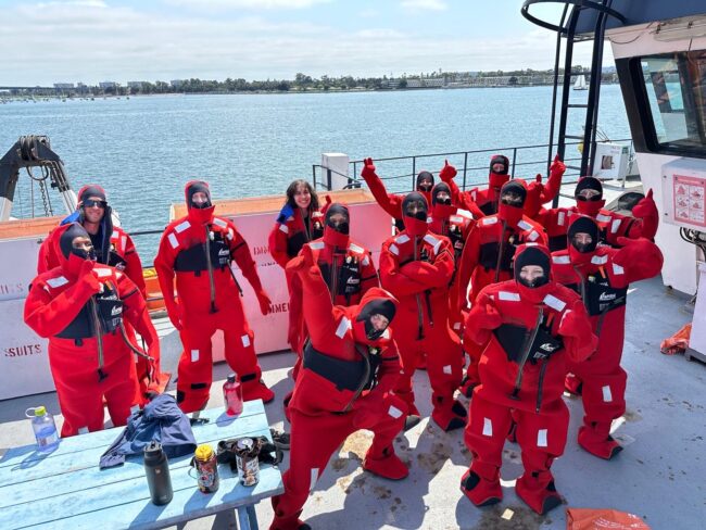 Researchers suited up aboard the Langseth research vessel