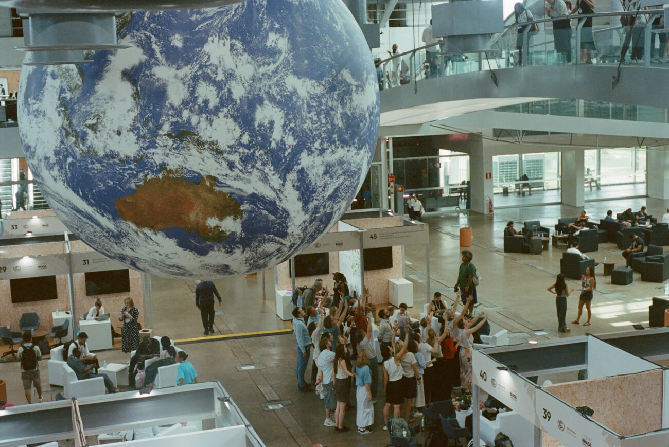 Globe and attendees at COP30
