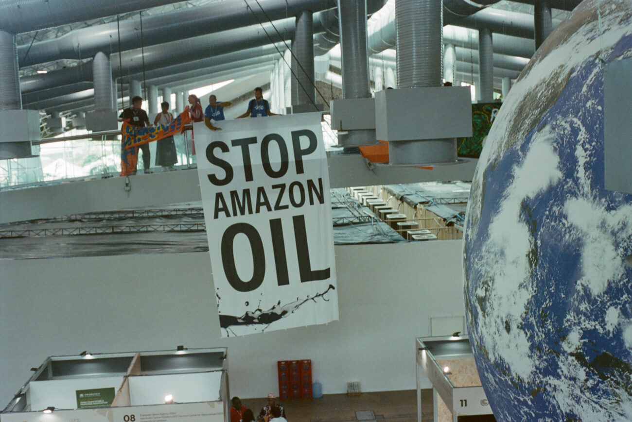 Stop Amazon Oil sign at COP30